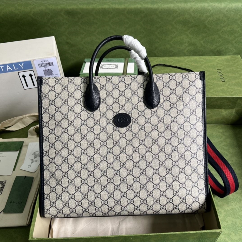 G*u*i shopping bags